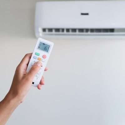 Cool air conditioner with remote control female hand, abnormal heat, heat rescue